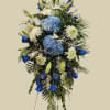 Blue and white floral standing spray with lilies and hydrangeas