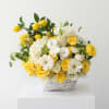 Bright yellow roses paired with creamy white roses and crisp white gerbera