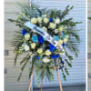 Funeral arrangement in blue and white. Perfect for a ceremony to celebrate