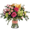 A fresh and vibrant floral arrangement designed to brighten any day. This