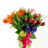 This arrangement expresses how wonderful life truly is. With vibrant colored tulips