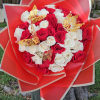 Red and white rose bouquet with gold butterfly decorations