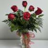 Keep it classic with our premium red roses. Six of them, arranged