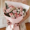 A sweet and charming bouquet featuring 7 soft pink roses, 6 delicate