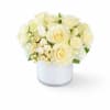 Cream-and-ivory roses clustered with pale white tulip buds create an elegant, serene
