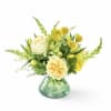 Pale yellow and creamy white roses mingle with sunny yellow chrysanthemums and