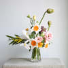 This airy, deconstructed floral arrangement is designed to look as if it