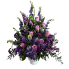 Lavender and deep purple blooms form a lush, layered tribute in this