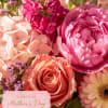Our Signature Mother's Day Bouquet is designed to feel full, vibrant, blooming
