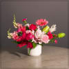 Lillies, Snapdragons, Gerbers, Roses, Carnations, Solomino with a Big Pink Bow in