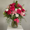 Lush hot pink roses take center stage in this Spicy Mama flower