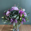 Lovely lavender and pink colors with fresh peonies and much more. A