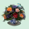 A cheerful tea-time arrangement that brightens any bedside or kitchen table, Tranquili-Tea