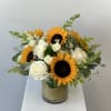Discover the radiant beauty of our Golden Sunrise flower arrangement, a stunning