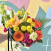 Sunlit yellow chrysanthemums and vibrant orange lilies set a joyful tone in