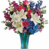 Hot pink roses, white asiatic lilies, blue hydrangea, fuchsia stock, blue delphinium