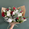 Show your love with this mixed bouquet of tulips and roses. Hand