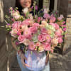 Large pink bouquet in a white hatbox with ribbon