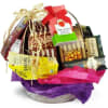 Basket of assorted candy and snack boxes with colorful tissue paper