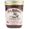 Jar of red raspberry jalapeño jam with a gold lid