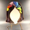 A playful stained-glass art mirror that feels like a tiny celebration -