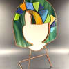 A modern stained-glass accent that looks like wearable art - this abstract
