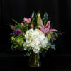 Southern Belle is a charming, graceful arrangement that captures timeless elegance with