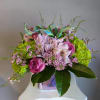 This beautiful Valentine's Day arrangement is full of love. Arranged in a