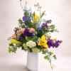 This arrangement has a light, garden-inspired feel, artfully composed in a smooth