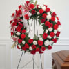 This beautiful wreath is a soothing mix of red and white roses