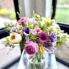 A lovely fresh flower arrangement in Lula vase with lovely blooms such