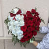 A heart-shaped floral arrangement that reads like a love letter: the Heart