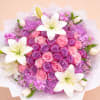 A luxury and romantic floral arrangement, featuring 50 premium roses in shades