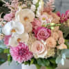 Soft, elegant, and absolutely unforgettable 

A dreamy floral arrangement featuring luxurious roses
