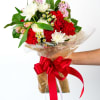 Bouquet of red and white flowers wrapped with a red ribbon