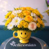 A burst of sunny yellow greets the eye-this everyday flower arrangement pairs
