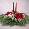 A compact holiday centerpiece that puts classic Christmas colors front and center: