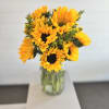 A simple, radiant sunflower arrangement designed to bring warmth and light to