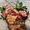 Antique carnations in peach, maroon, mauve and dusty pink carnations with some