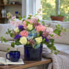 Awakening Dawn Arrangement is a soft, elegant floral design created in soothing