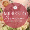 Mother's Day premium floral arrangement with pale pink and cream blooms