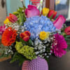Spring blooms in a knob vase