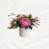 Our popular mini 3&rdquo; rustic tins are filled with fresh, seasonal blooms