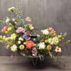A beautiful wreath created to surround an Urn. Please indicate color preference