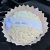 Cream rose bouquet with a Happy Birthday ribbon in a car seat