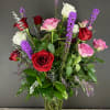 This stunning dozen rose arrangement is the perfect gift for your sweetheart!