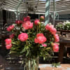 Pink peonies arranged in a clear glass vase