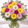 A lively, springlike bouquet that feels like sunshine in a vase-this Floral