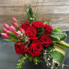 Wow your Valentine with a beautiful arrangement of 12 premium red roses