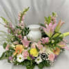 This arrangement is meant to provide a soft final embrace to a